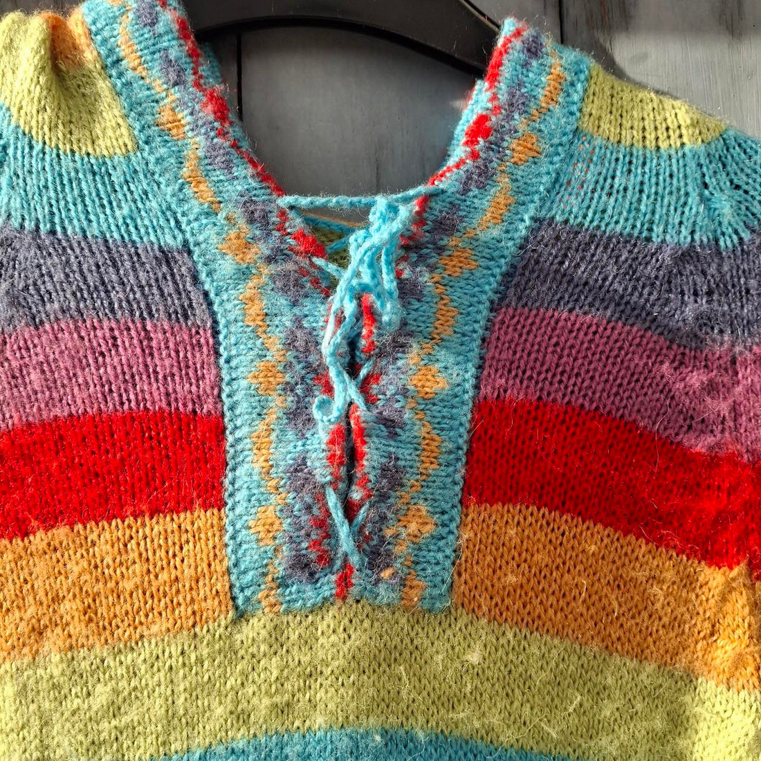Colourful Multi-Coloured Rainbow Alpaca Wool Poncho With Fringed Hem. - Festigal