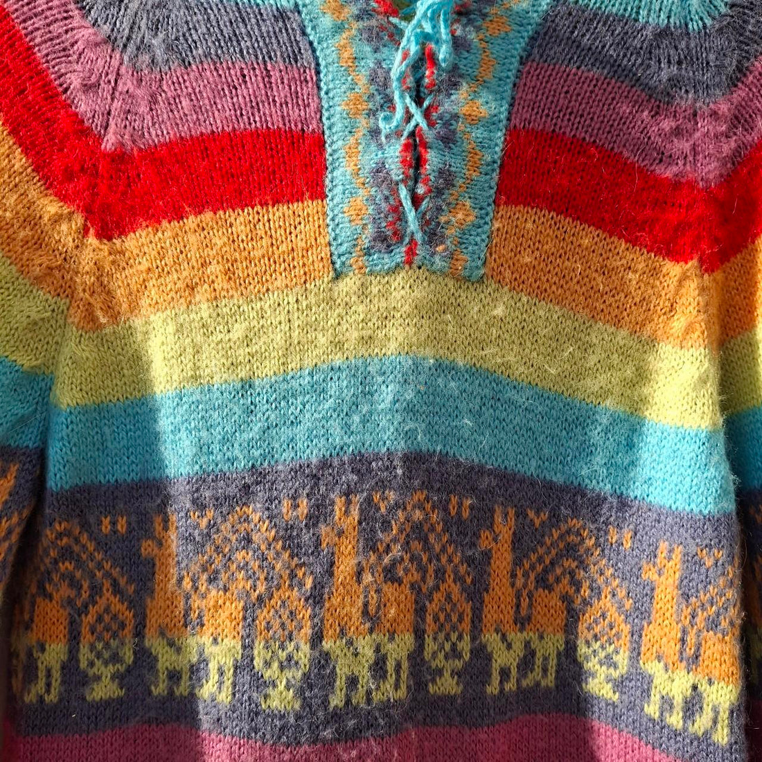 Colourful Multi-Coloured Rainbow Alpaca Wool Poncho With Fringed Hem. - Festigal