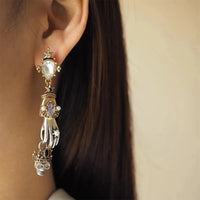 Hand & Skull Drop Earrings