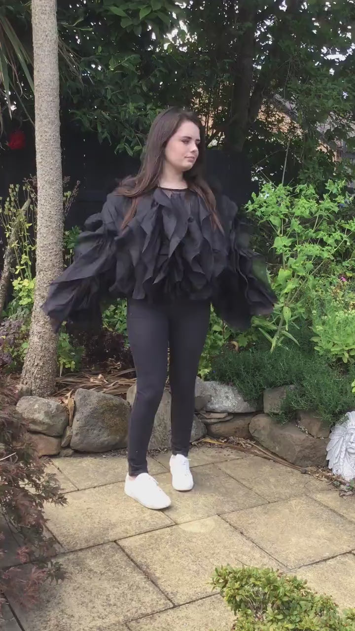 Übertriebene Chiffonbluse mit Rüschen